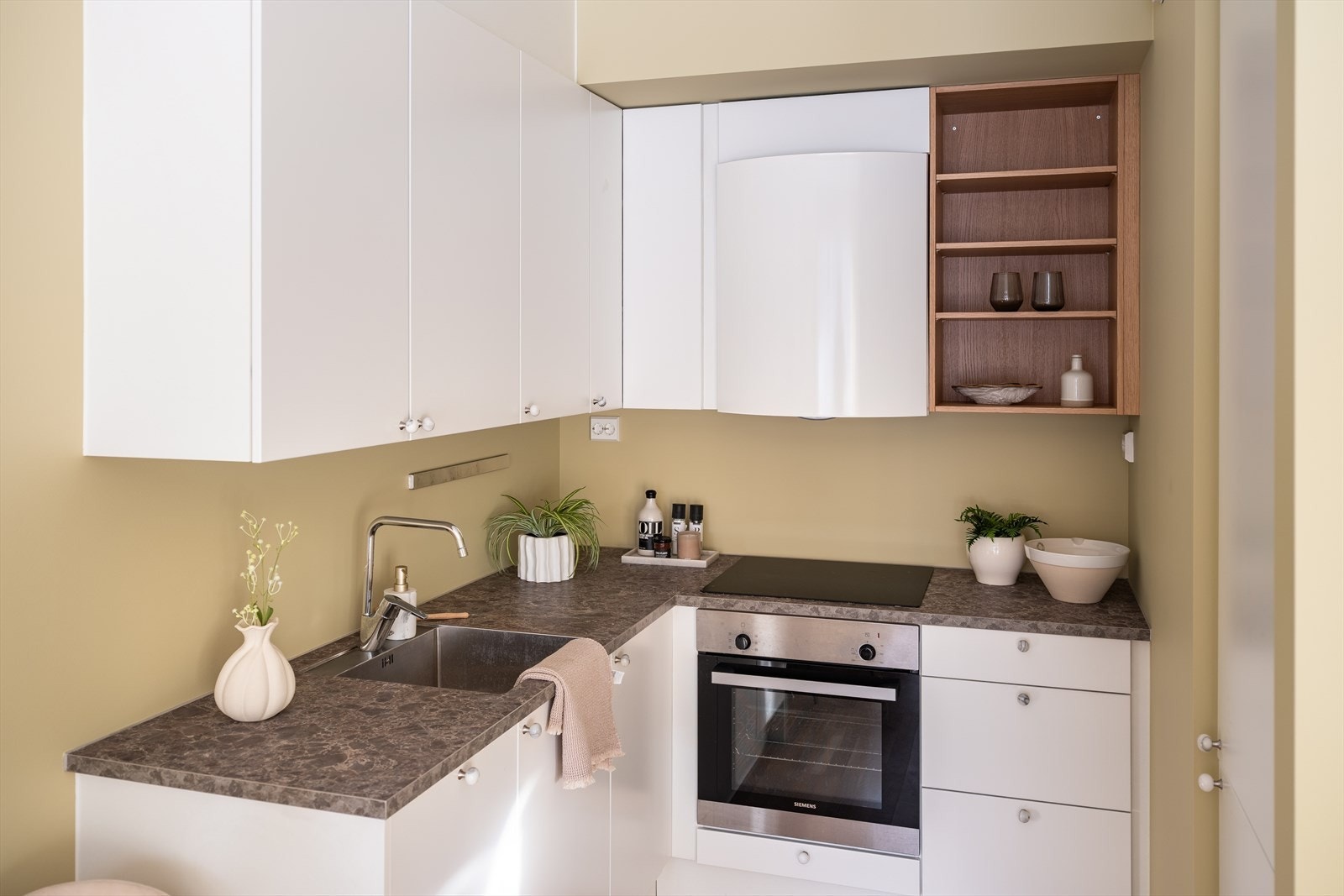 I likhet med store deler av leiligheten er kjøkkenet vurdert til TG0 av takstmann. Galleribilde