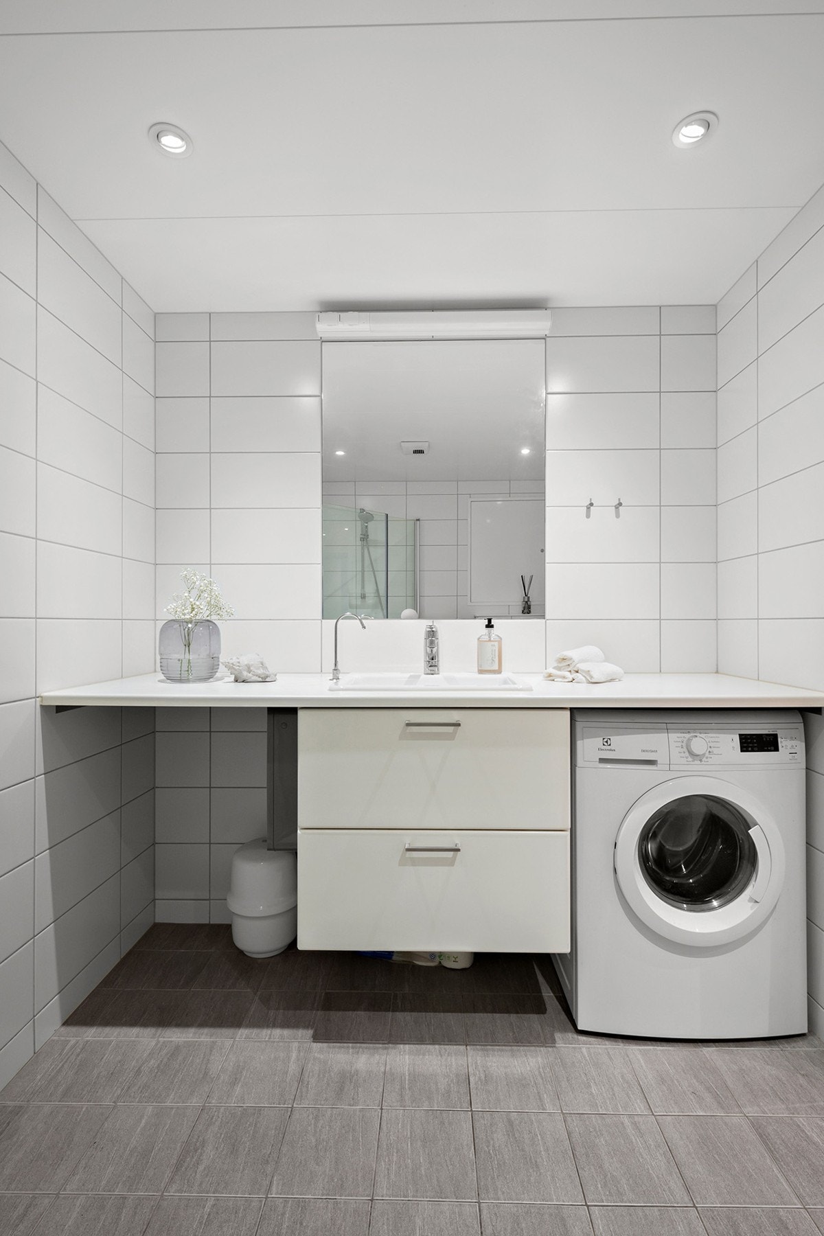 Badet har opplegg for vaskemaskin. Galleribilde