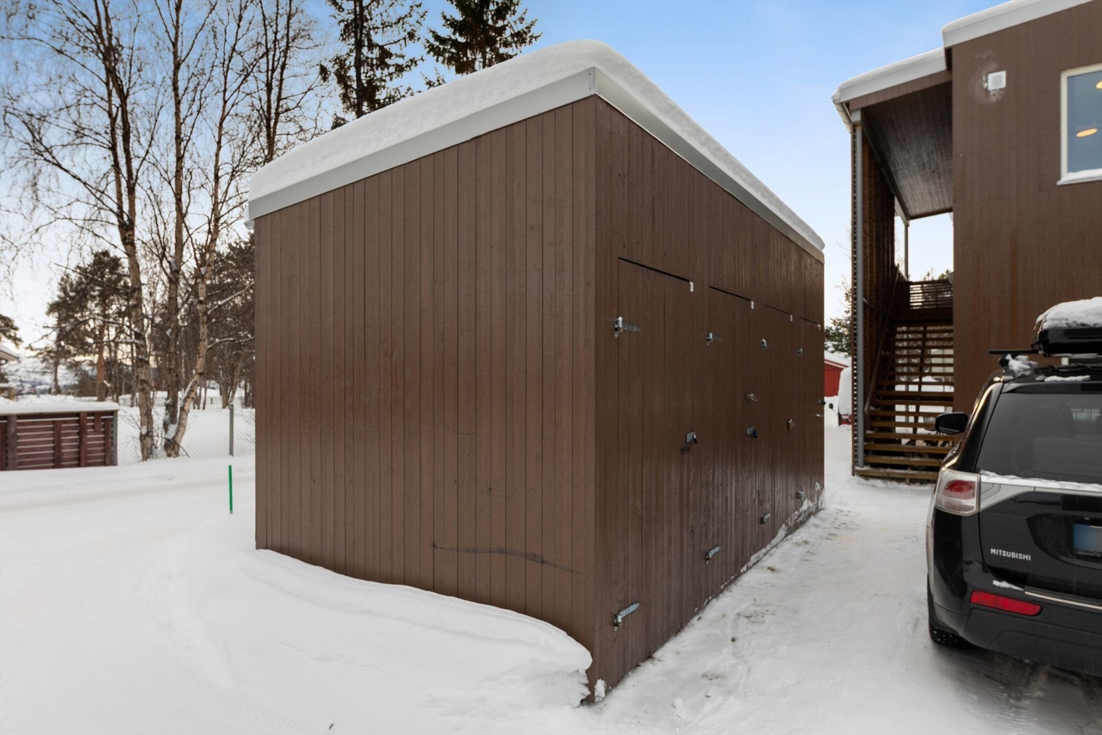 Ekstra lagringsplass i frittstående utebod. Galleribilde