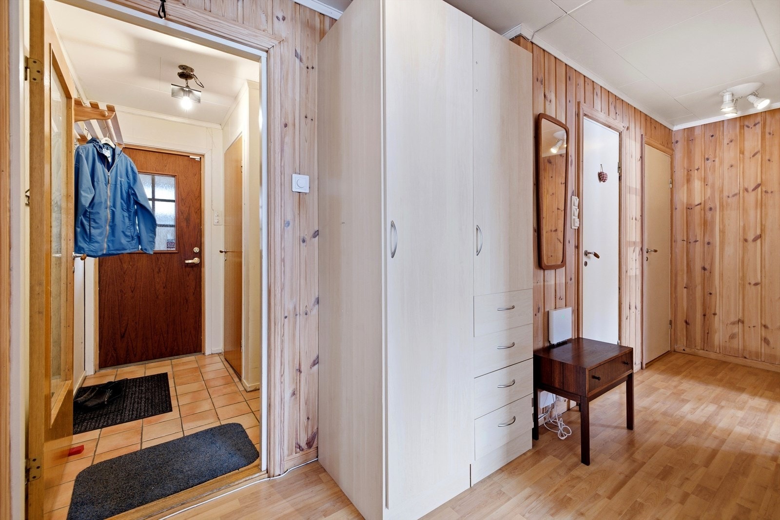 Gangen fungerer som et bindeledd mellom etasjens ulike rom. Galleribilde