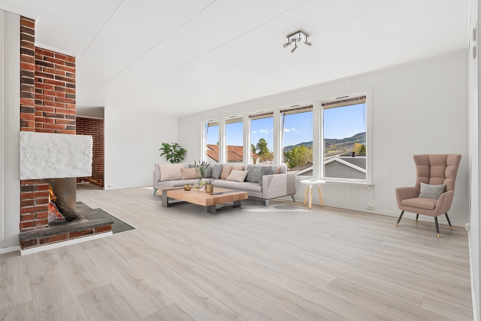 Stuen er romslig med god plass til møblering av ulike soner. (Bildet er digitalt stylet) Galleribilde