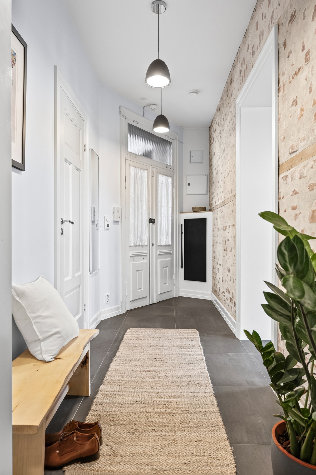 Entréen gir et svært godt førsteinntrykk av leiligheten Galleribilde