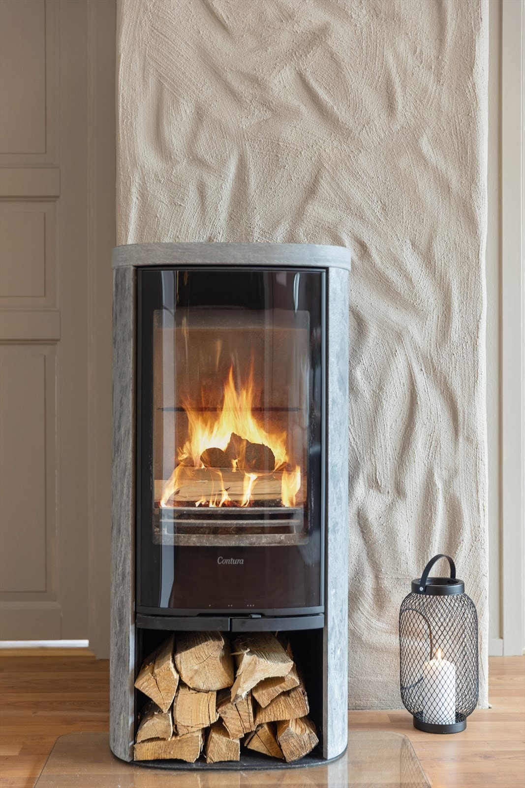 Peisovnen varmer godt på kalde vinterdager og gir en lun stemning. Galleribilde