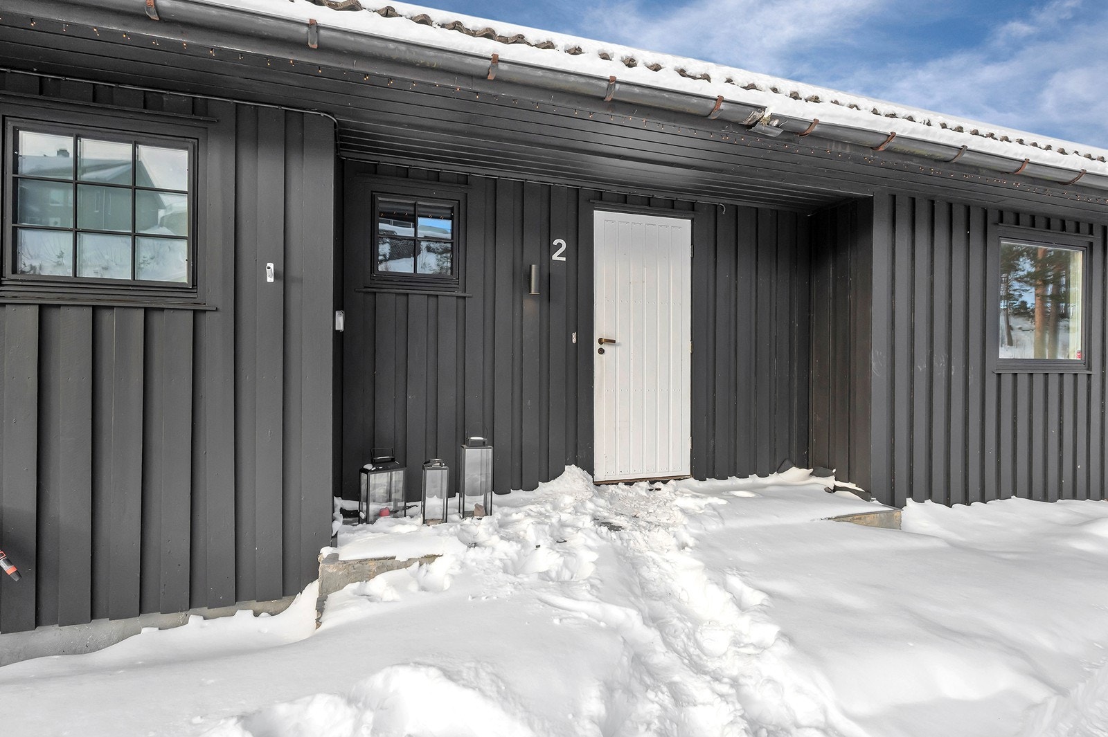 Hyggelig inngangsparti som er delvis overbygd Galleribilde