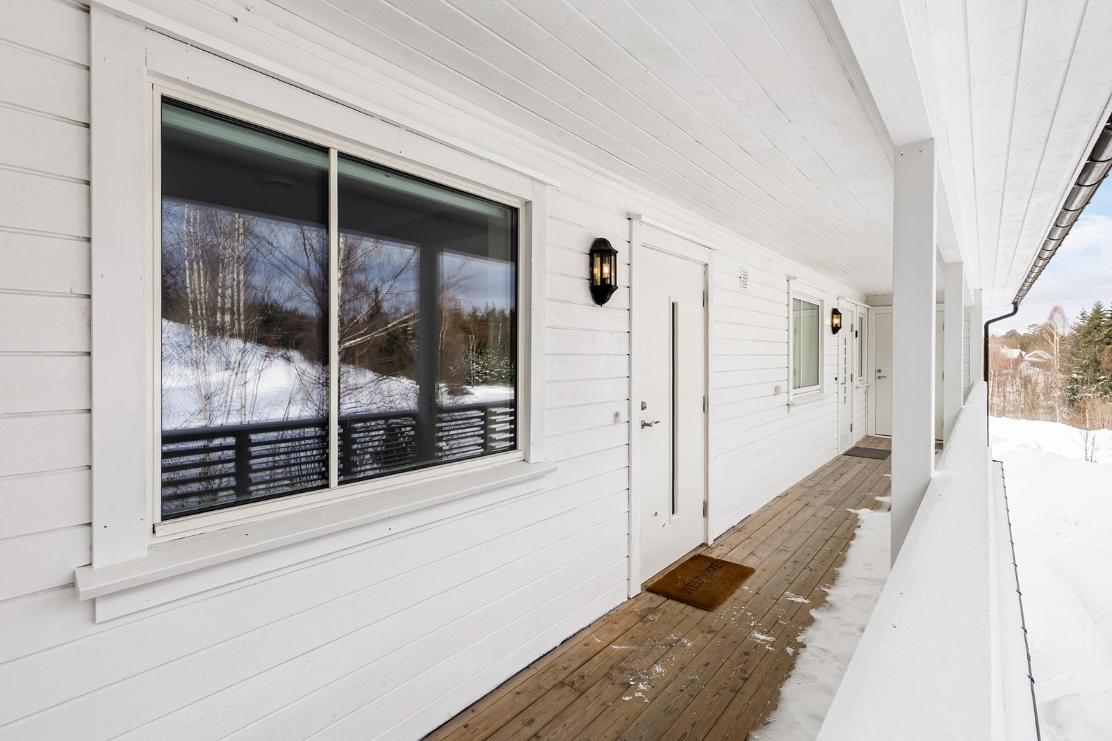 Hyggelig overbygd inngangsparti Galleribilde