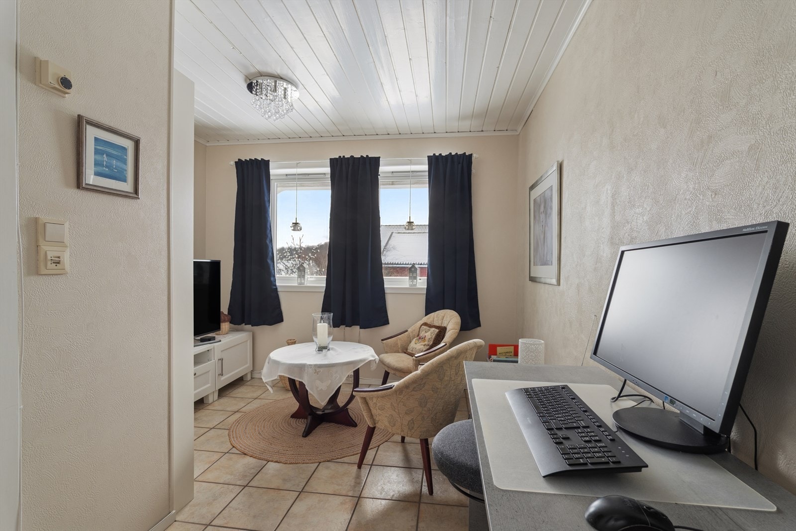 Dette rommet egner seg godt som et kombinert gjesterom og kontor. Galleribilde