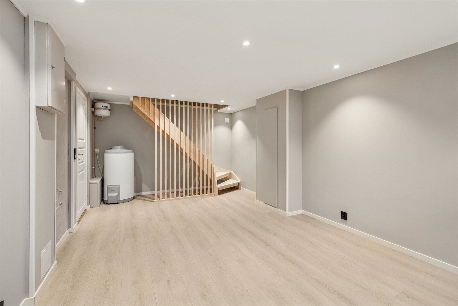 Den ekstra stuen i U. etasje gir hjemmet fleksibilitet og åpner for nye muligheter i hverdagen. Galleribilde