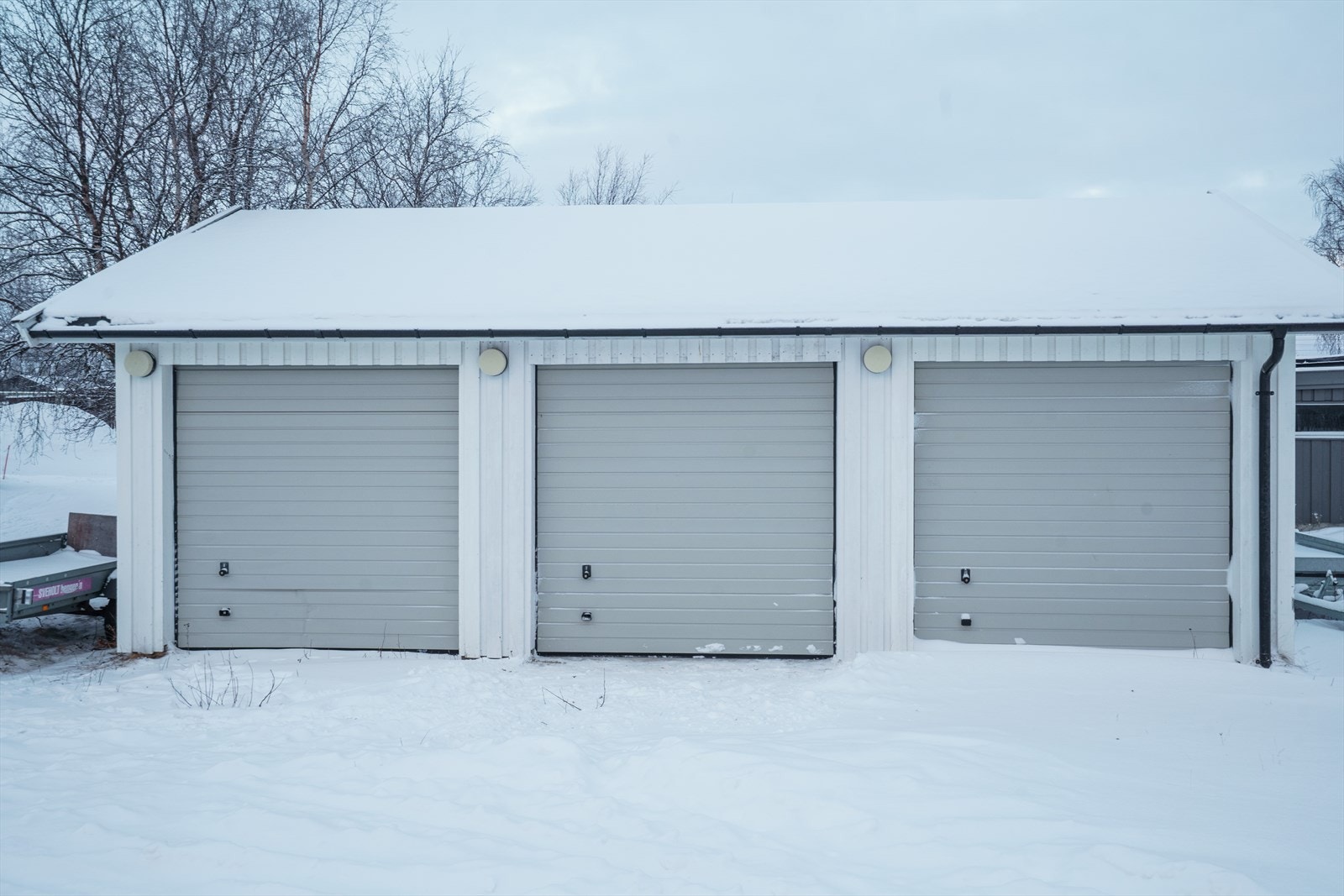 Det er den midtre garasjen som hører til Ulveveien 31. Galleribilde