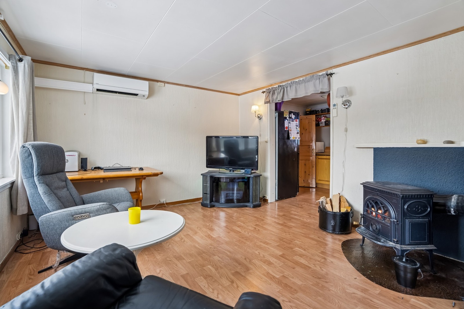 Rommet har flere møbleringsmuligheter og kan innredes med både sofa- og spisegruppe. Galleribilde