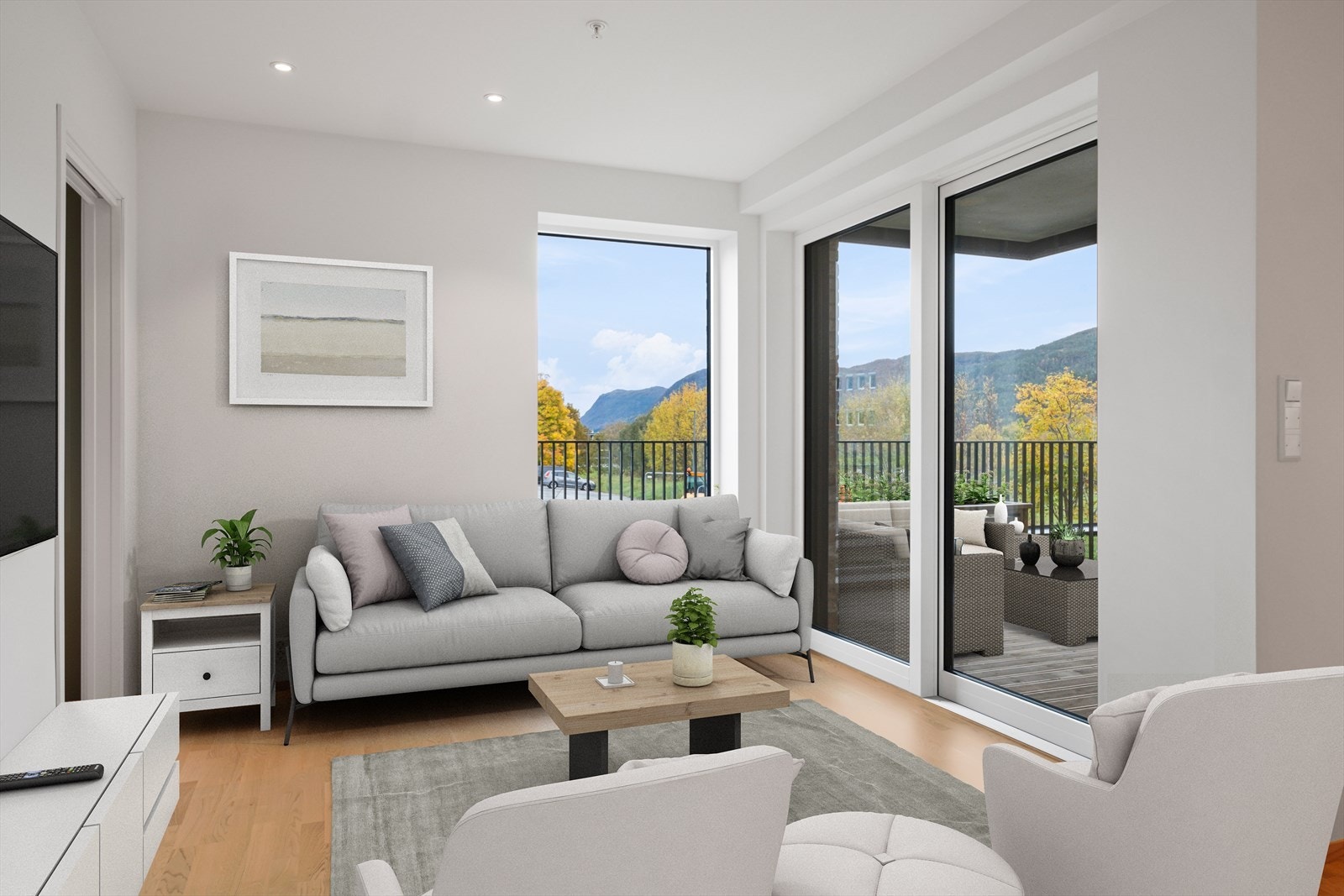 Store vinduer og balkongdør med 3-lags energiglass gir godt lysinnslipp og utsikt til uteområdet. Galleribilde