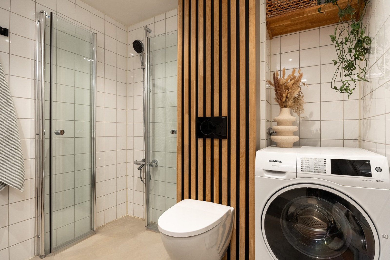 Badet har opplegg for vaskemaskin. Galleribilde