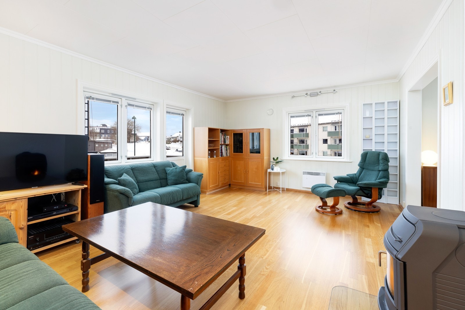 Stue med vedovn Galleribilde