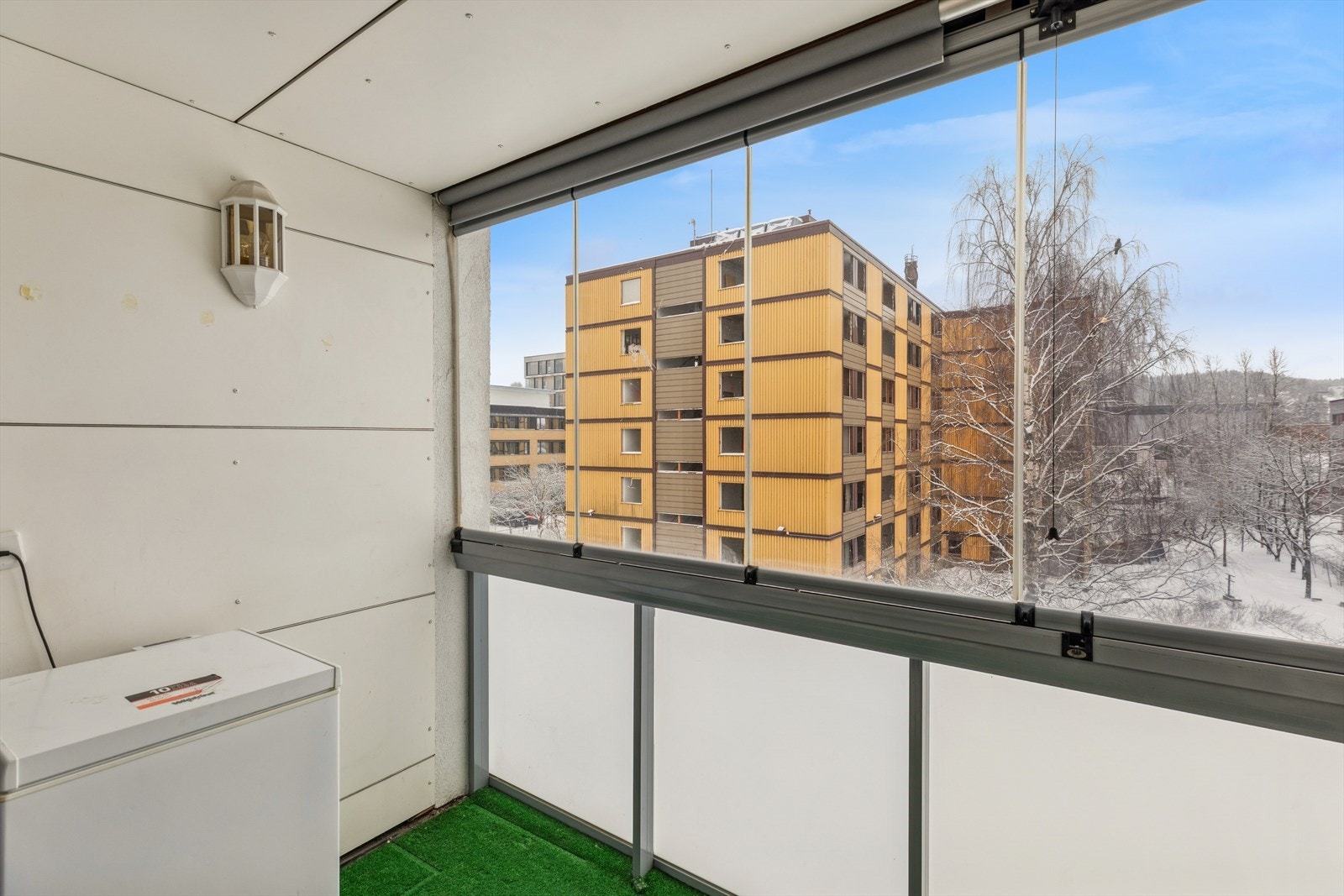 Fra balkongen har du et fint og grønt utsyn over nærområdet. Galleribilde