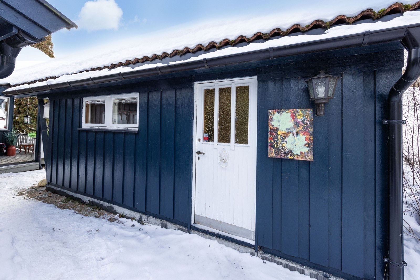 Utendørs har man også en praktisk utvendig bod for ekstra lagringsplass. Galleribilde