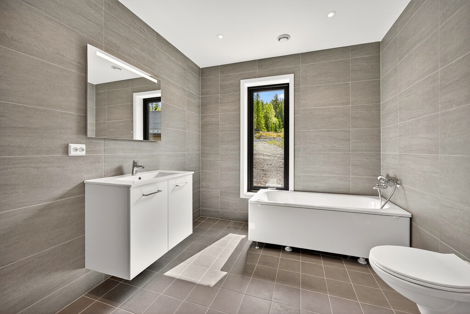 Det blir to delikate bad, et med opplegg for vaskemaskin og tørketrommel. Bilder er ikke av selve boligen, kun ment som illustrasjon. Galleribilde