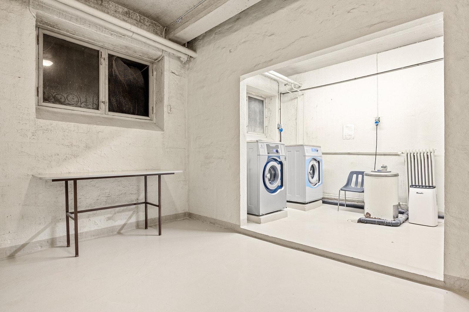 Fellesvaskeri i kjeller er inkludert i felleskostnadene. Galleribilde