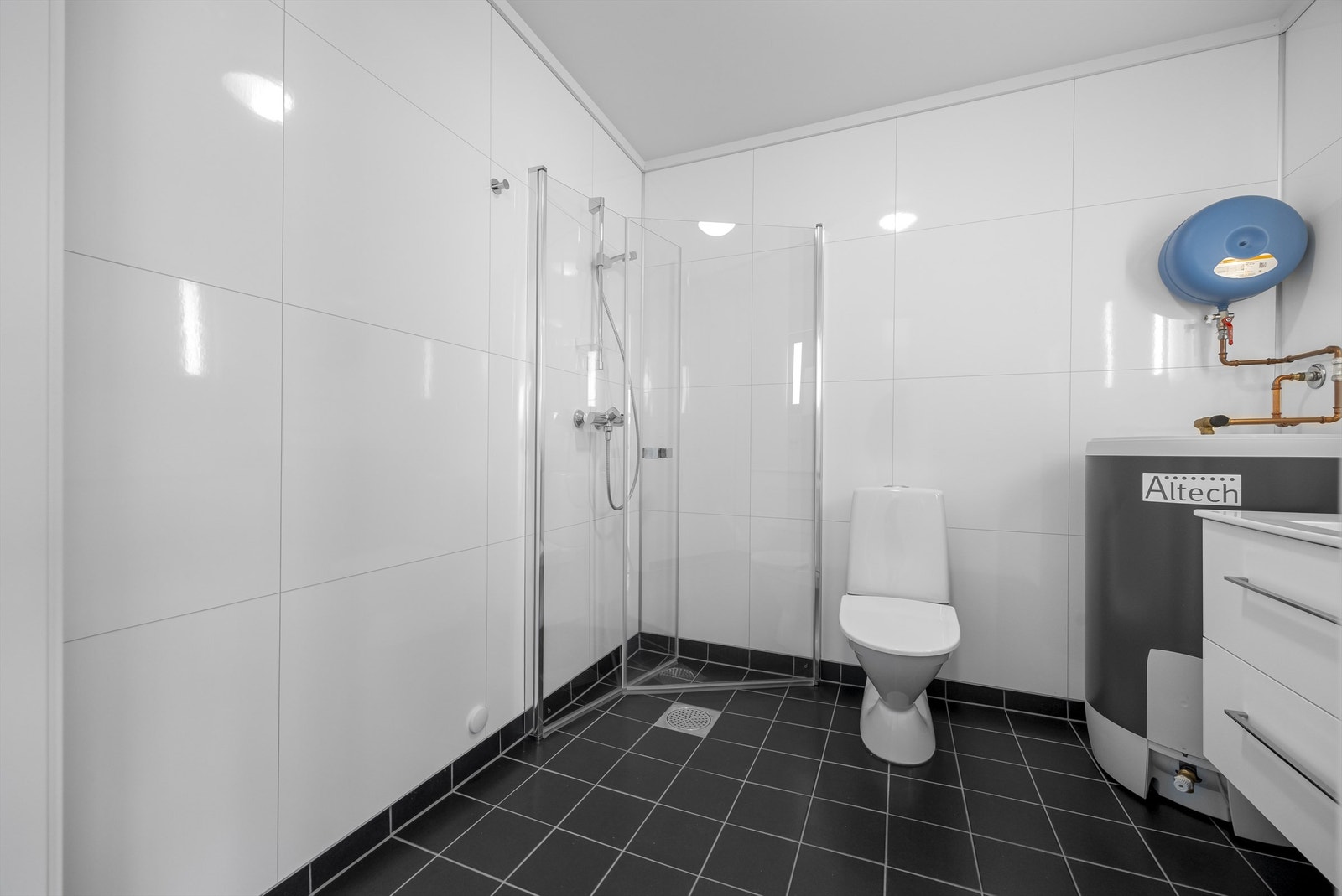 Bad/vaskerom med gulvvarme. Galleribilde