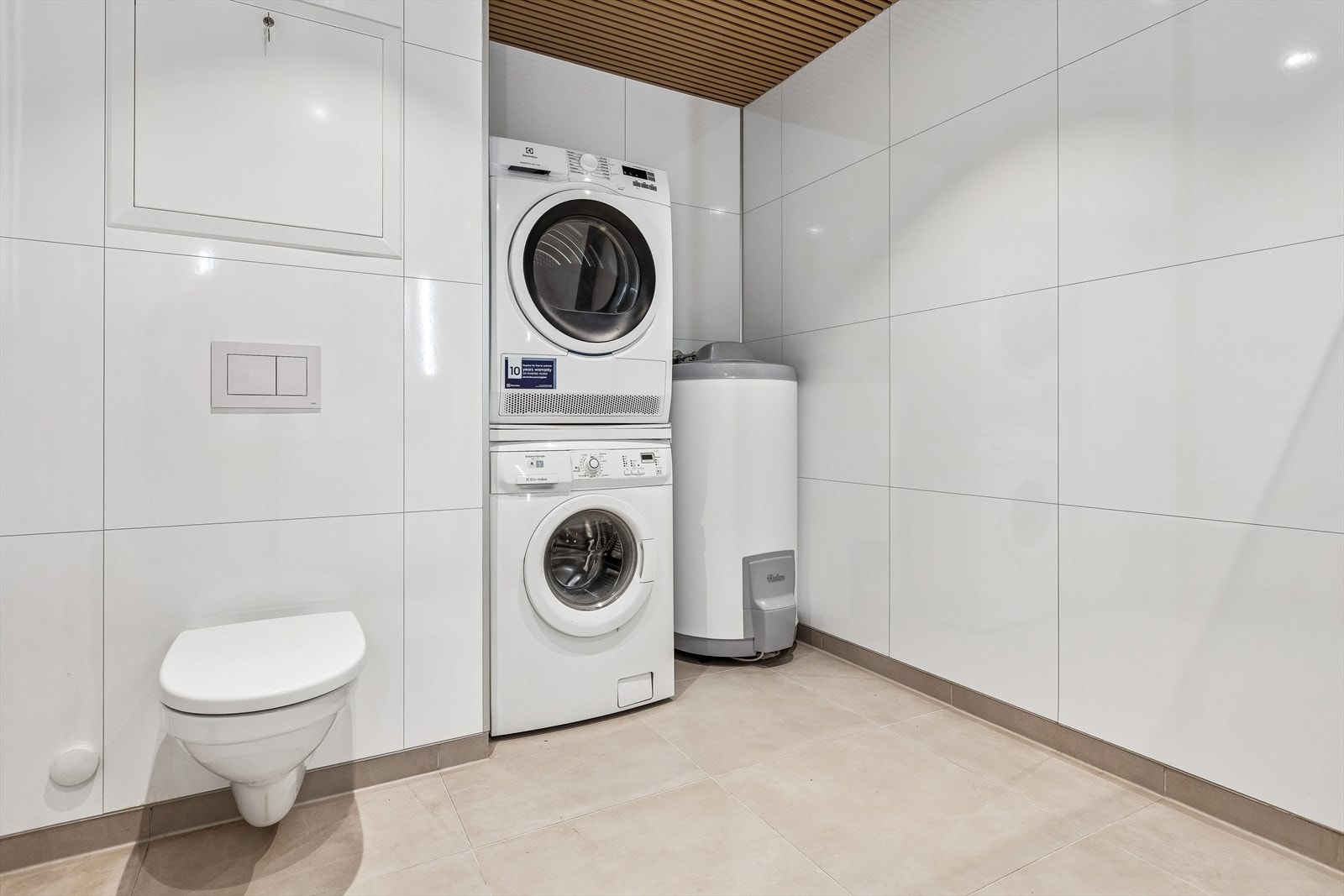 Opplegg for både vaskemaskin og tørketrommel. Galleribilde