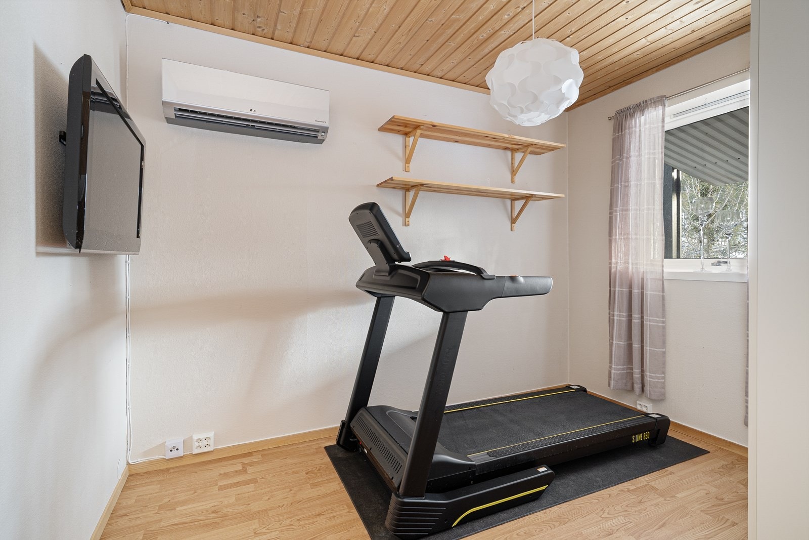 Soverom som er innredet som trimrom. Galleribilde