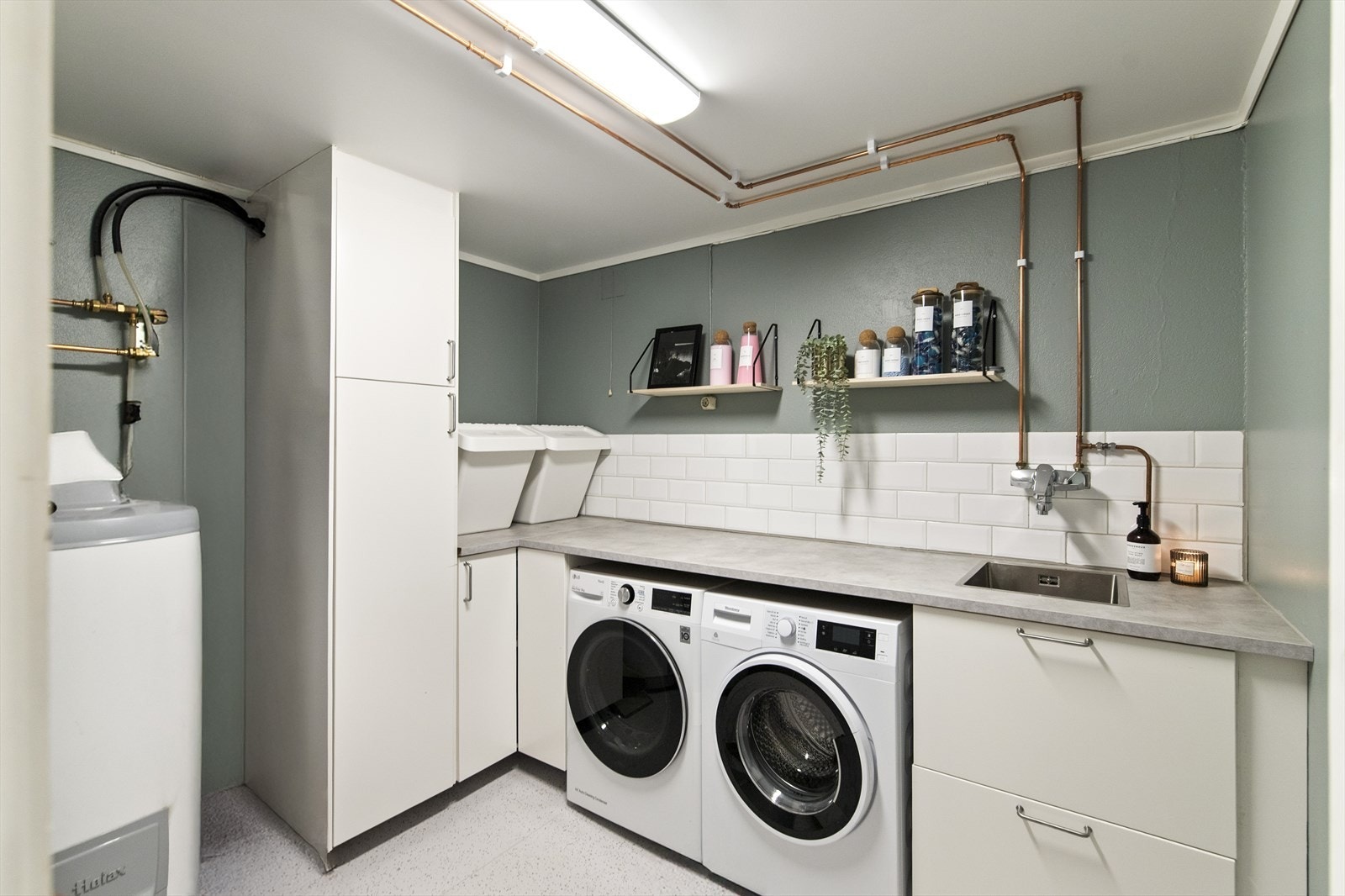 Vaskerommet ble oppgradert med nye overflater og nytt sluk i 2021. Galleribilde