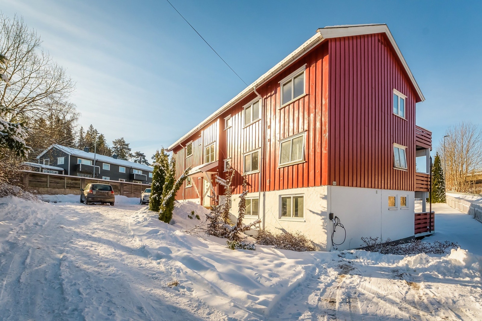 Det medfølger en egen parkeringsplass med leiligheten Galleribilde