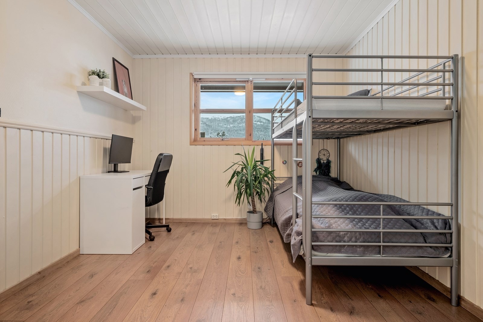 Soverommet i sokkeletasjen måler ca. 11 kvm. Galleribilde