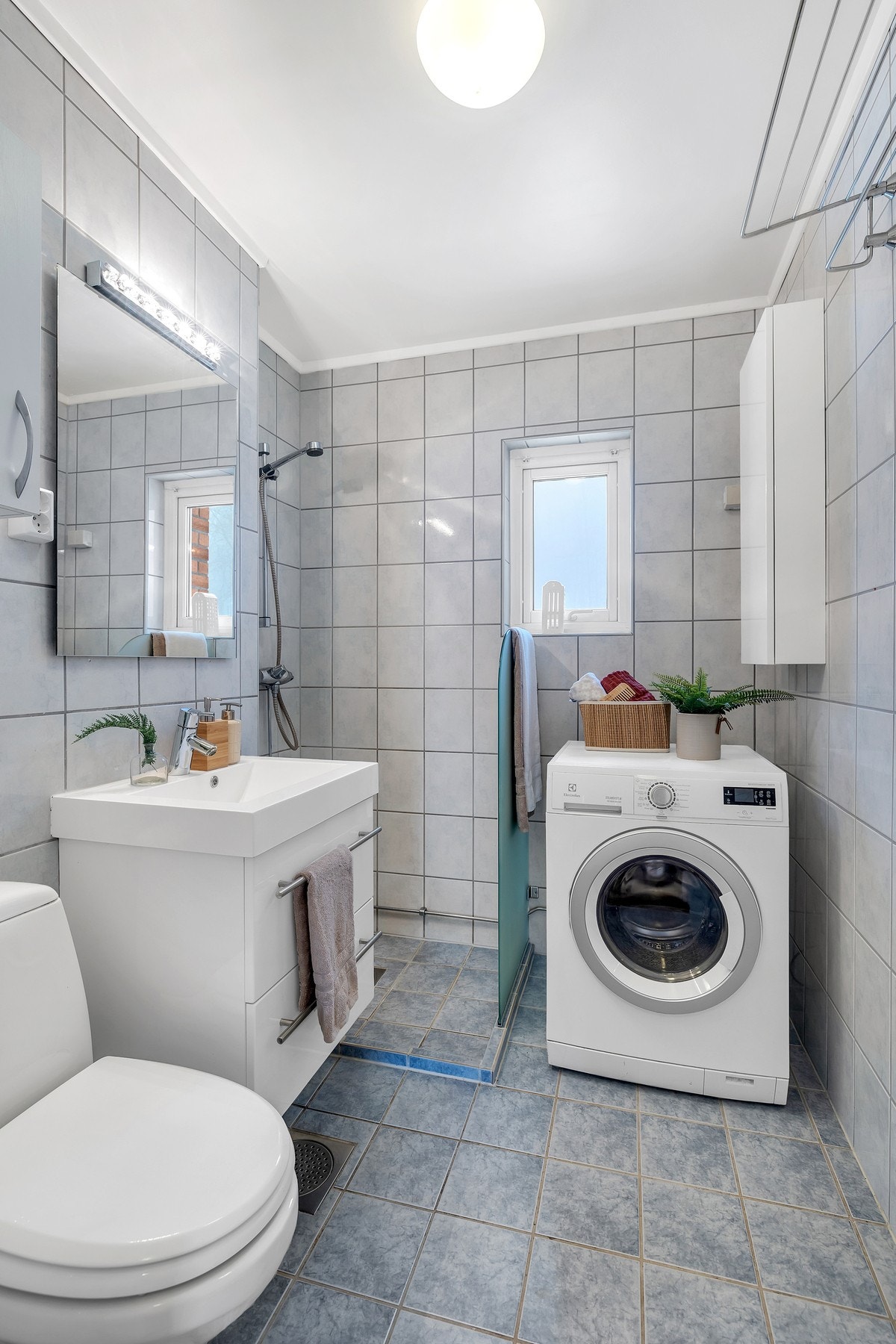 Flislagt bad/wc med gulvvarme Galleribilde