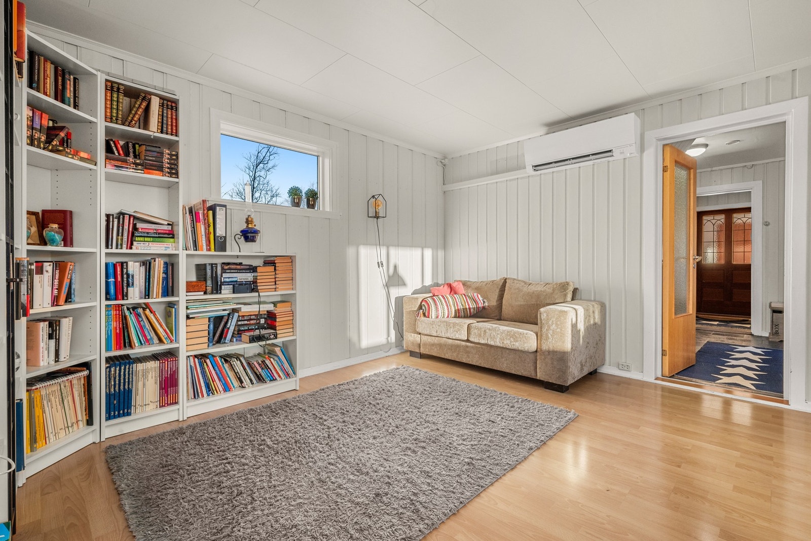 En koselig krok i stuen som inviterer til rolige kvelder hjemme. Galleribilde