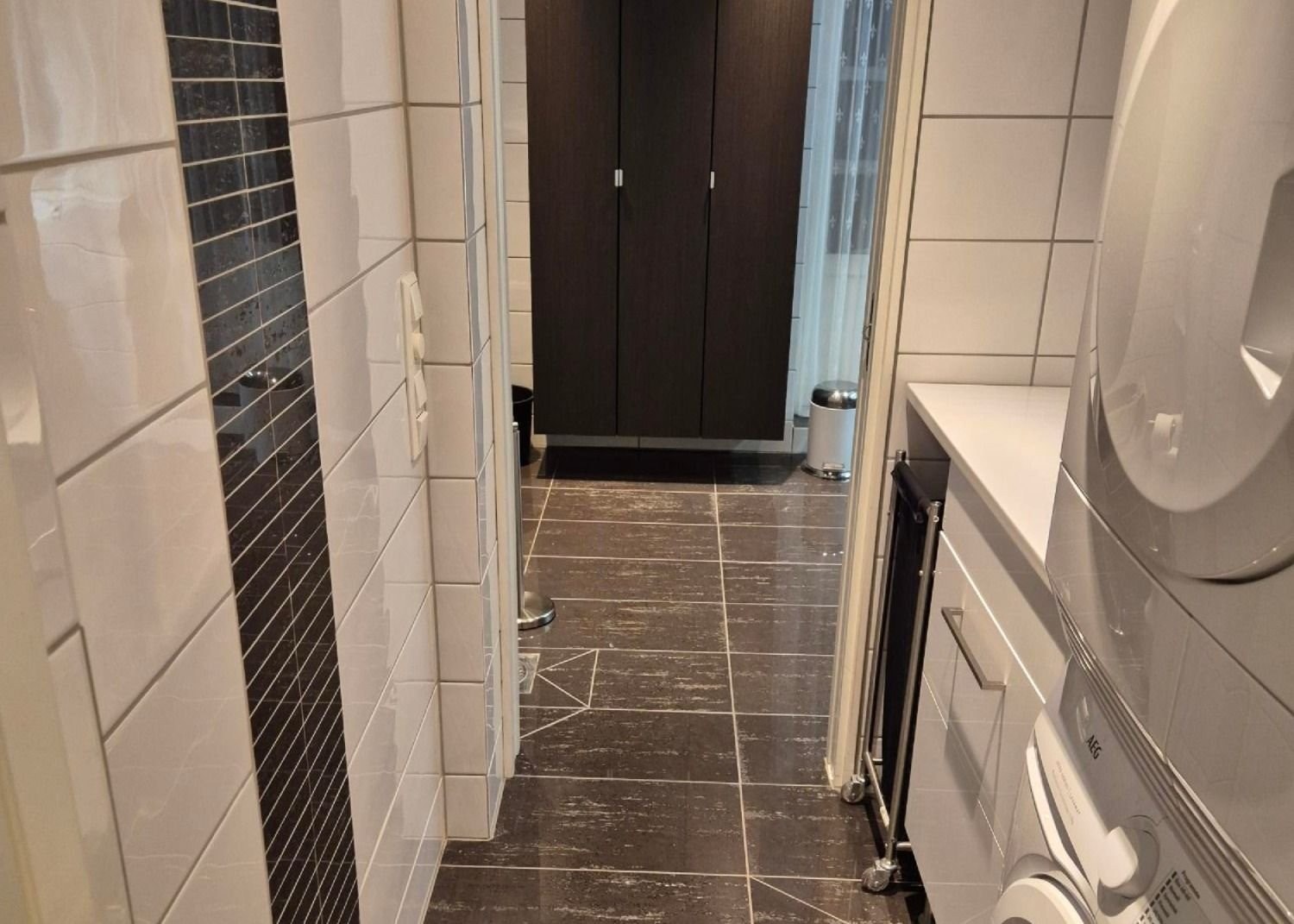 Område for vaskemaskin og tørketrommel. Galleribilde