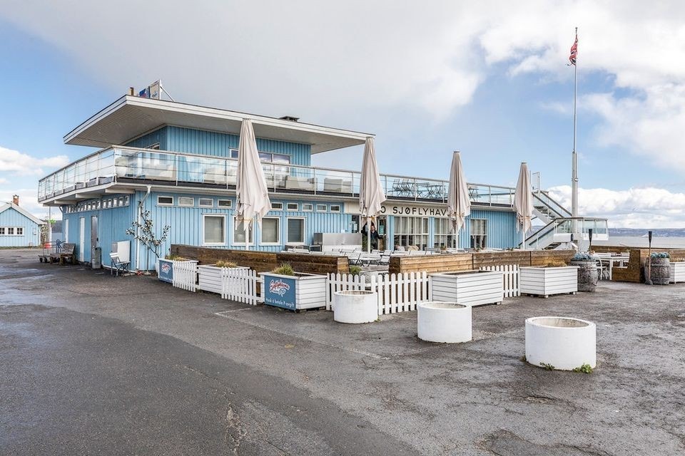 Sjøflyhavna er et populært samlingssted på sommertid, og ligger kort spasertur fra leiligheten Galleribilde