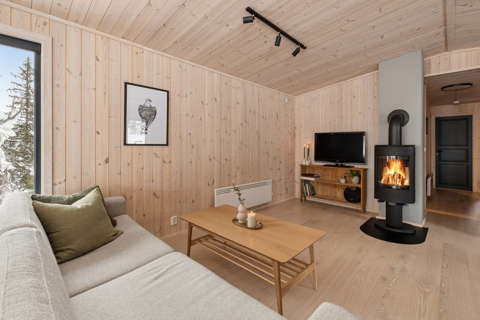 Peisovnen skaper en lun atmosfære og gir god varme på kalde dager. Galleribilde