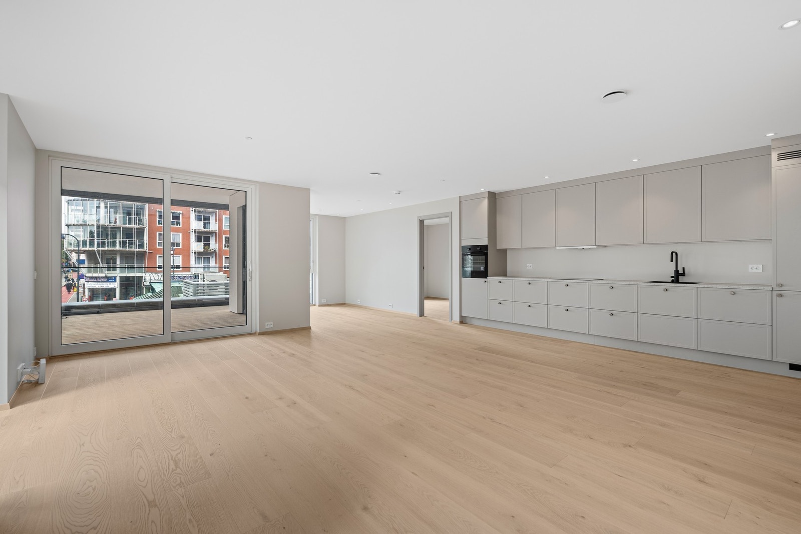 Stue/spisestue med åpen kjøkkenløsning Galleribilde