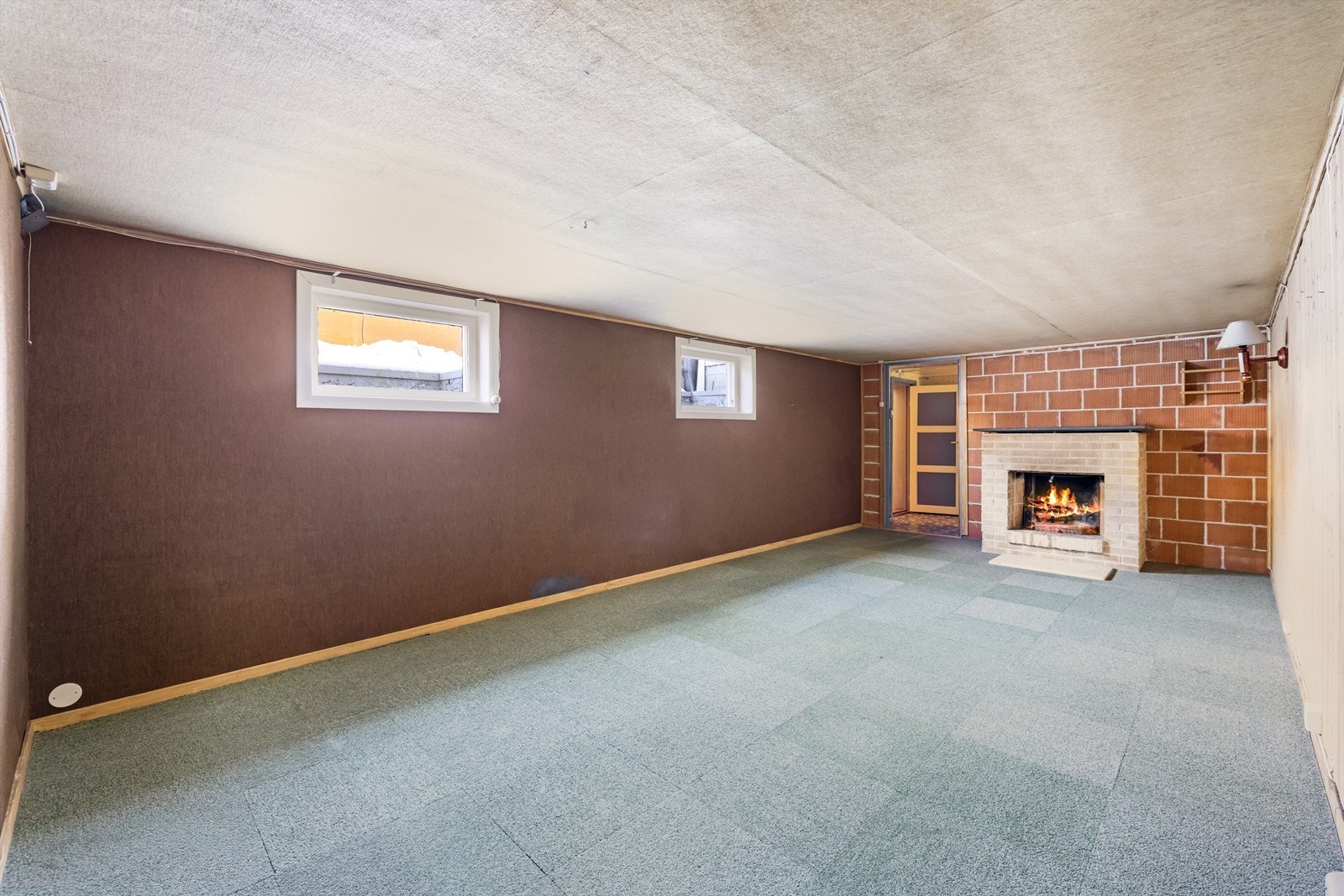 Rommet har også en egen peis Galleribilde