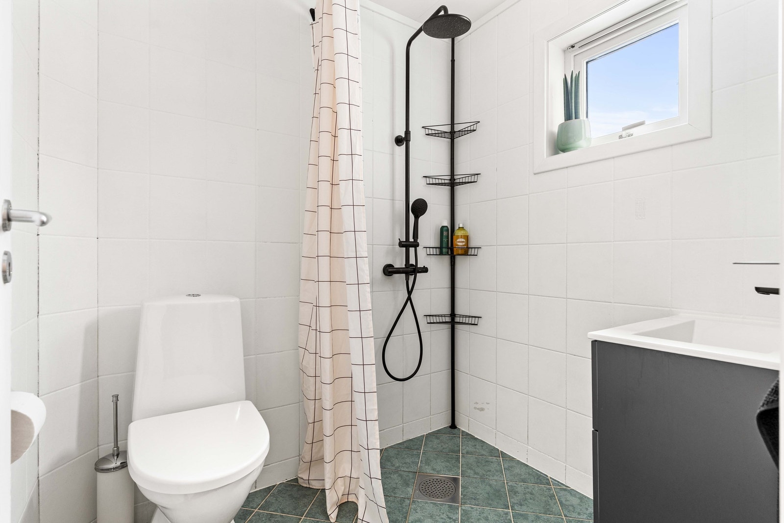 Badet har elektriske varmekabler. Galleribilde