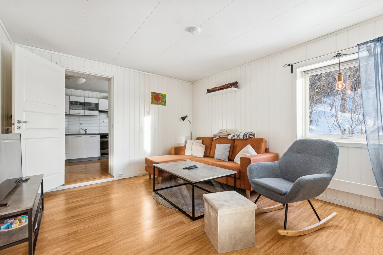 Bod innredet som stue. Ikke omsøkt hos Bodø kommune. Galleribilde