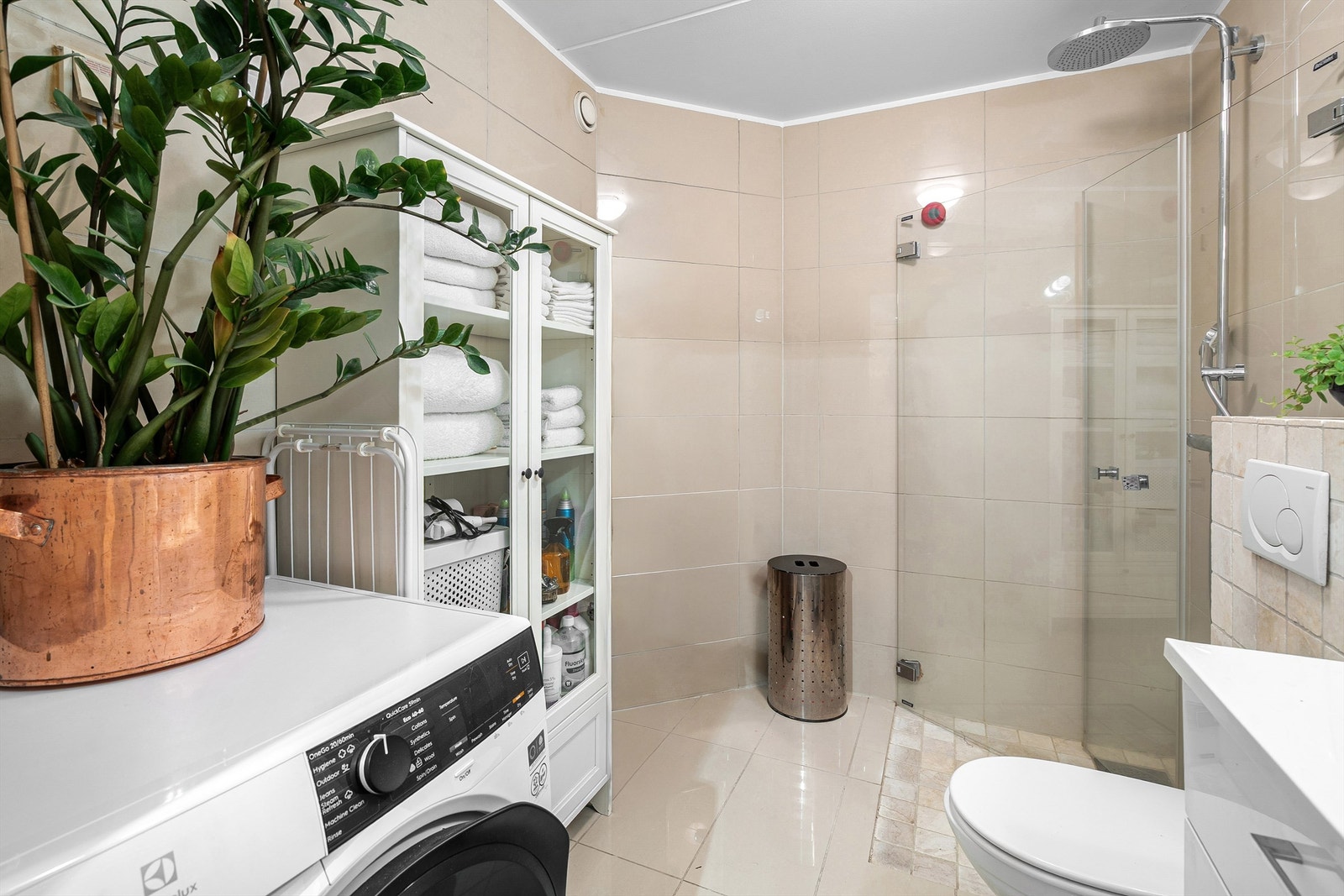 Det er opplegg for både vaskemaskin og tørketrommel. Galleribilde