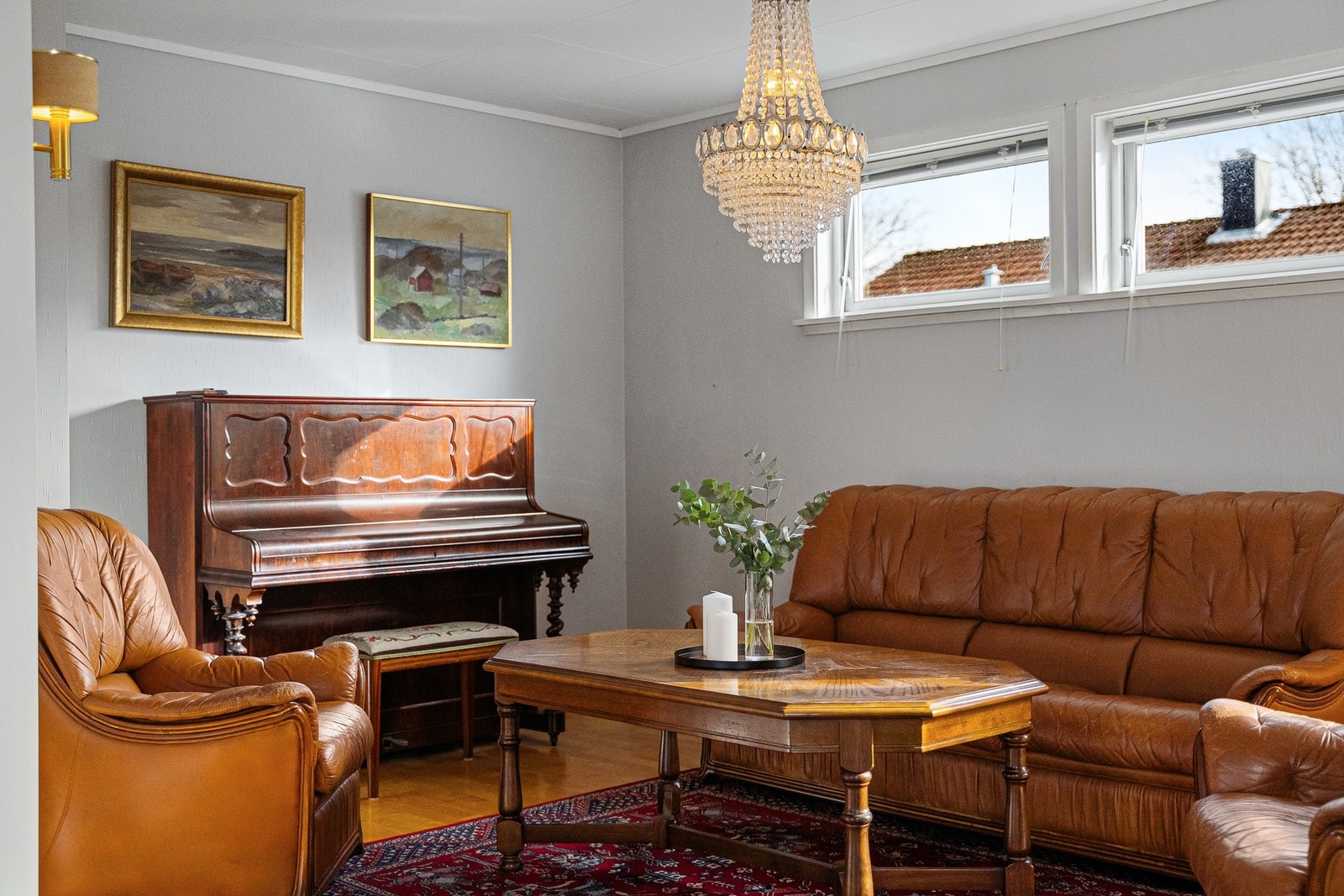 Stuen har en lun og hyggelig atmosfære Galleribilde