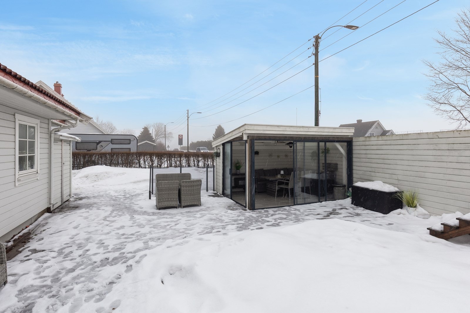 Hagestue på markterrasse. Galleribilde