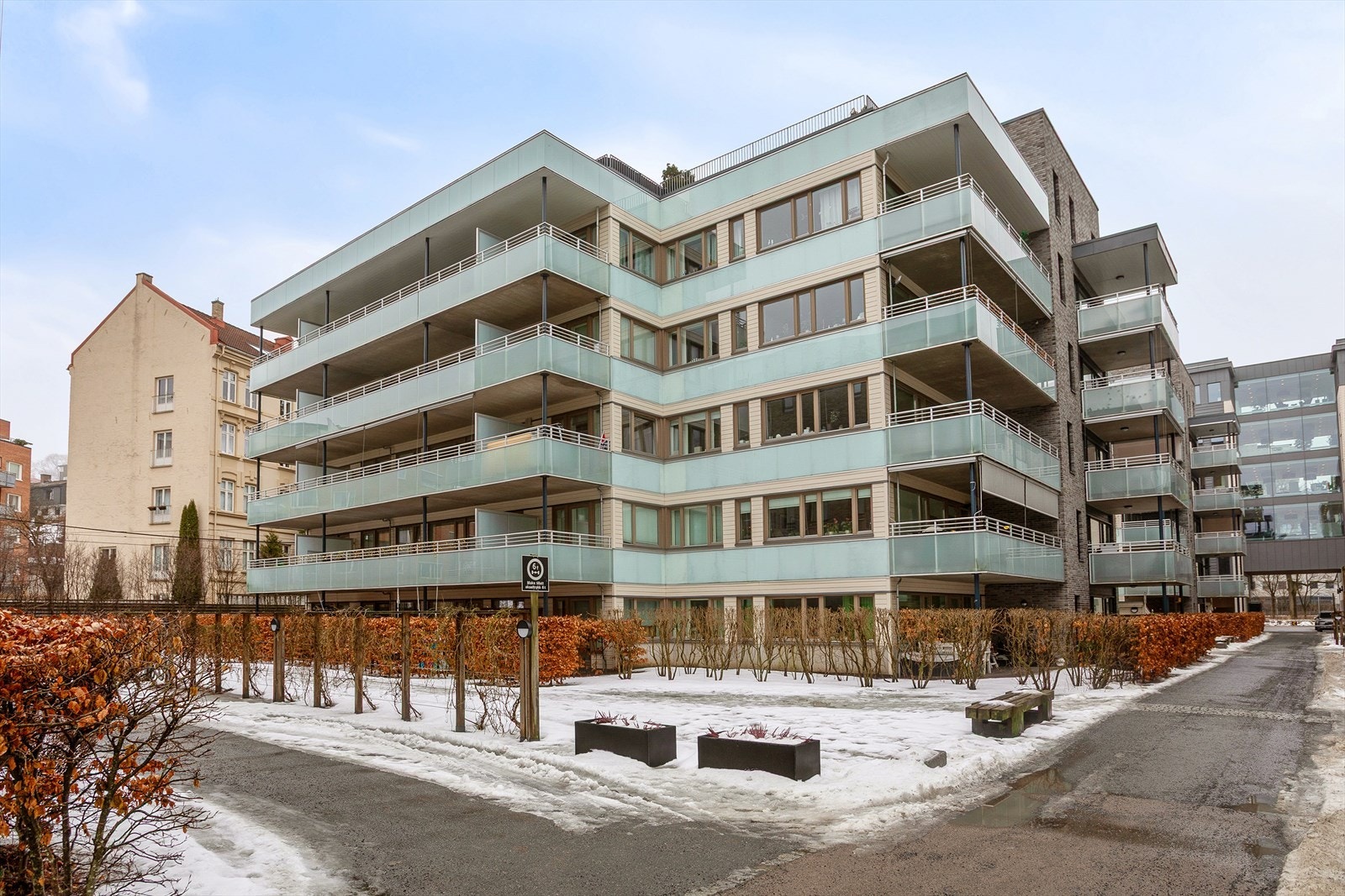 Fellesområdene består av pene grøntområder og asfalterte internveier Galleribilde