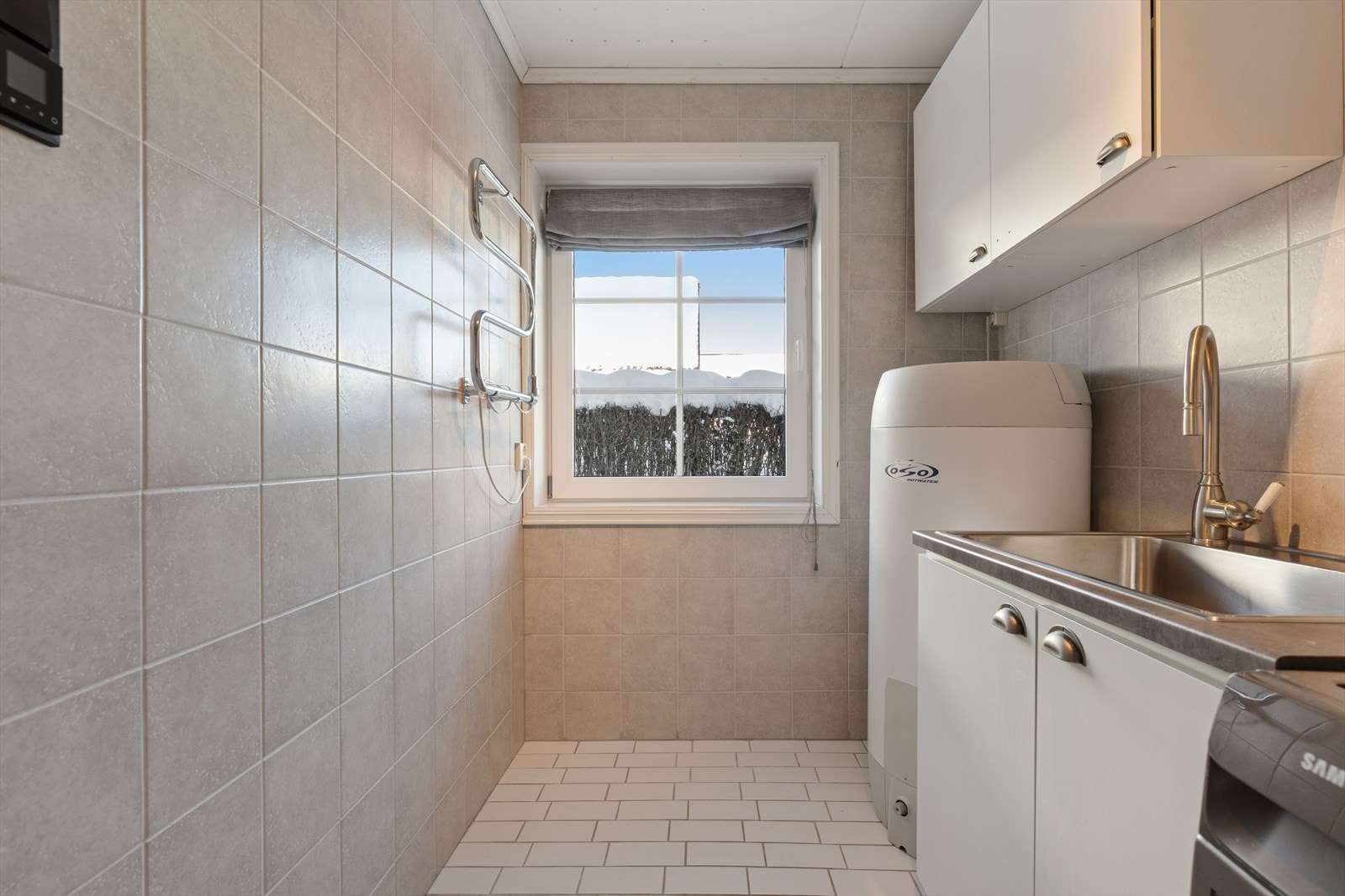 Praktisk vaskerom med gulv varme. Galleribilde