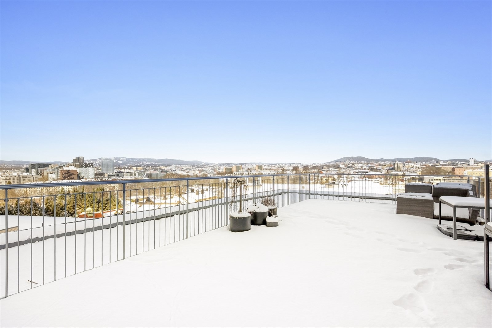 Beboerne i bygget har tilgang til en felles takterrasse. Galleribilde