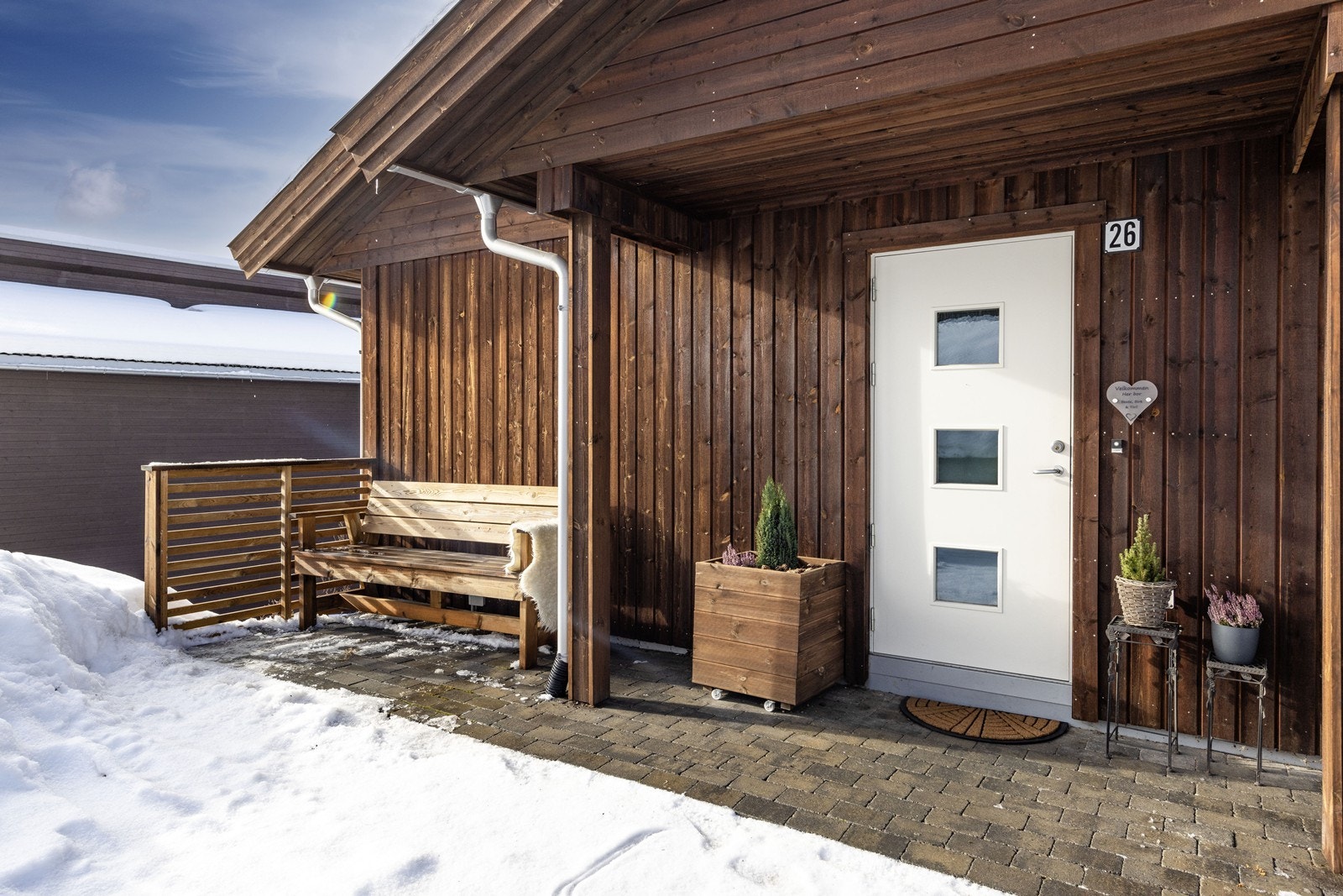 Inngangspartiet gir en hyggelig velkomst med mulighet for en koselig sitteplass. Galleribilde