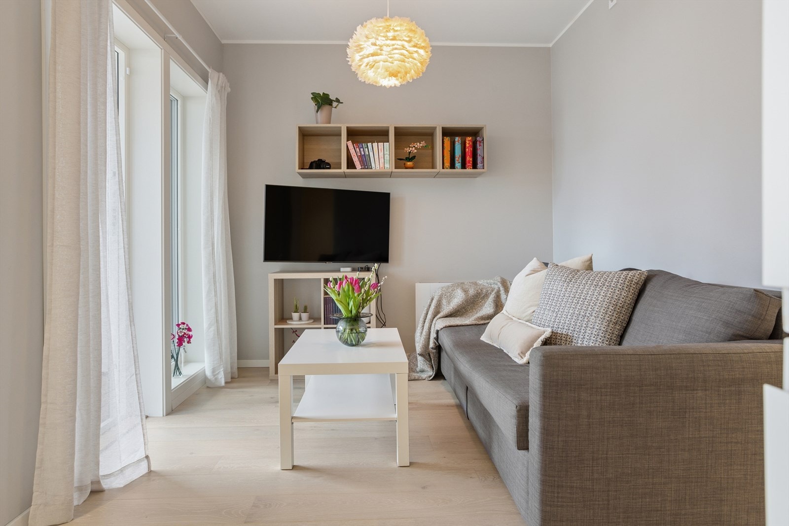 Her kan du enkelt skape en komfortabel sone for både tv-kos og sosiale sammenkomster. Galleribilde