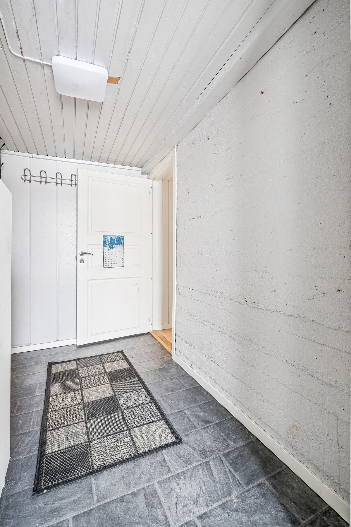 Gangen som tar en videre til resterende rom i underetasjen. Galleribilde