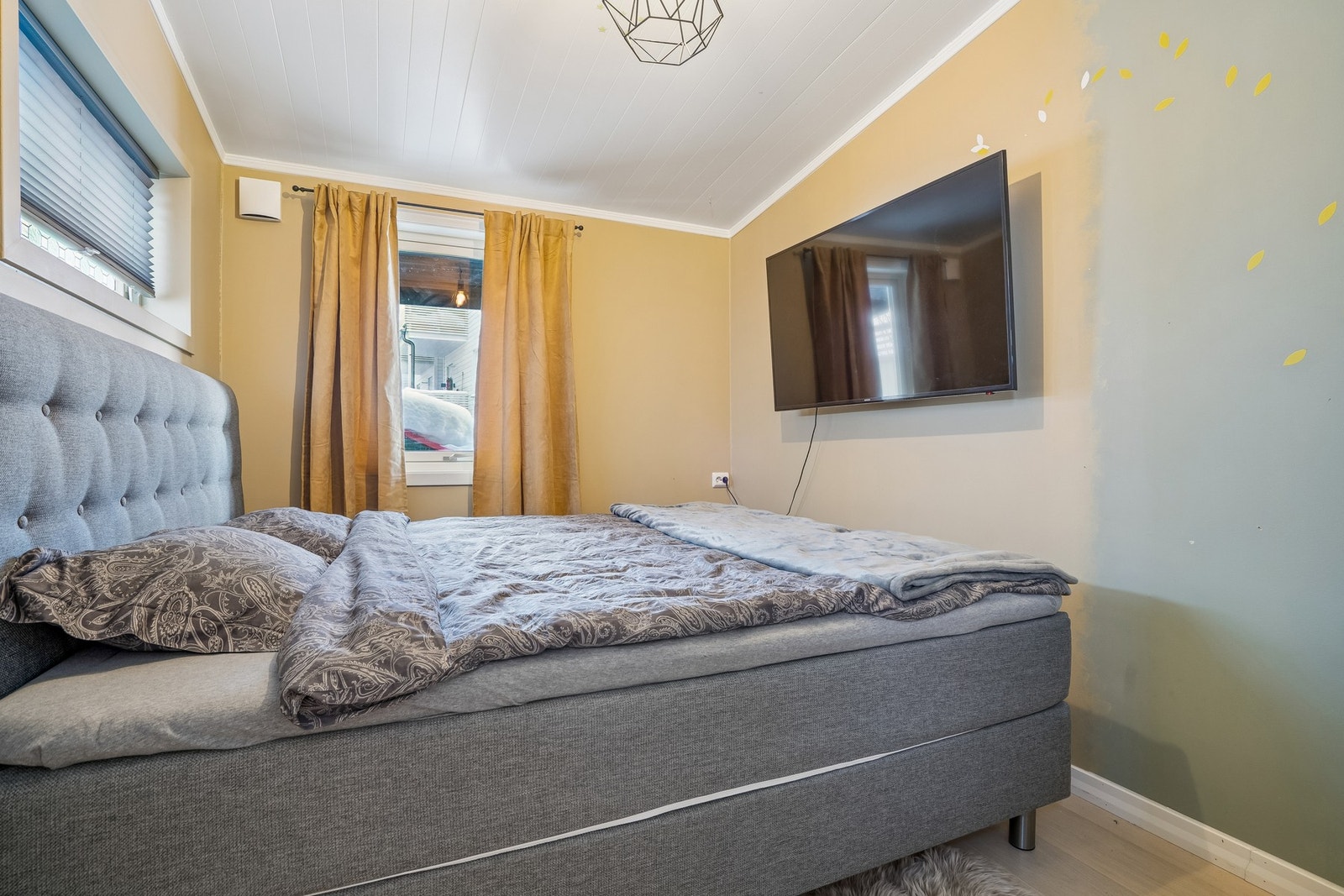 En gjennomført fargepalett, skaper en rolig og avslappende atmosfære Galleribilde