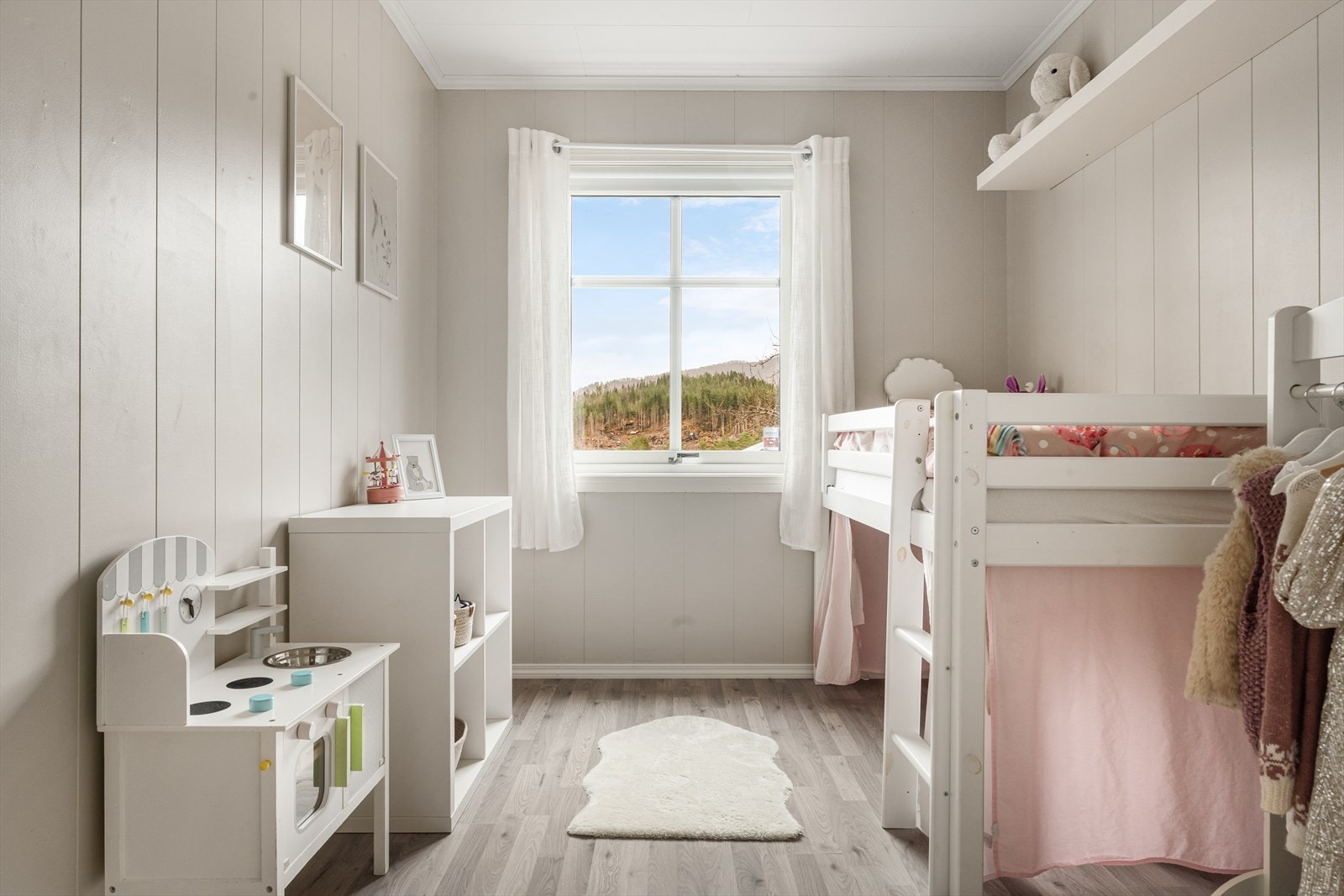 Duse fargetoner gir rommene et lyst og innbydende uttrykk. Galleribilde