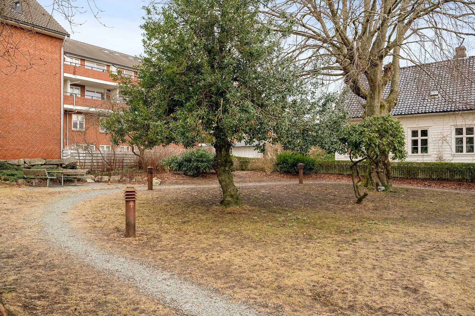 Sameiets atrium er vendt ut mot parken, som er en nydelig grønn lunge på Storhaug Galleribilde