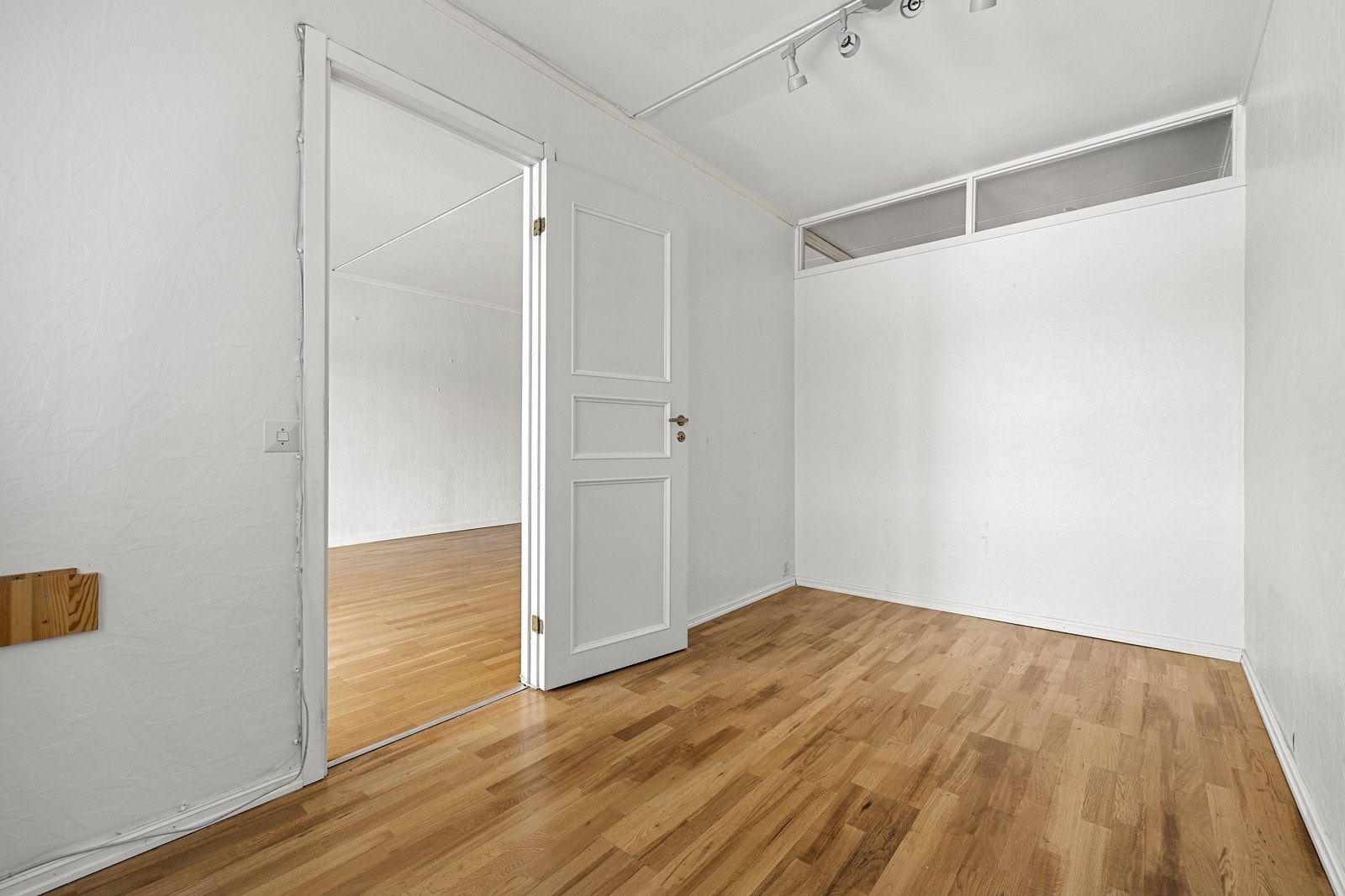 Leiligheten har to soverom, hvorav dette rommet også egner seg godt som kontor. Galleribilde