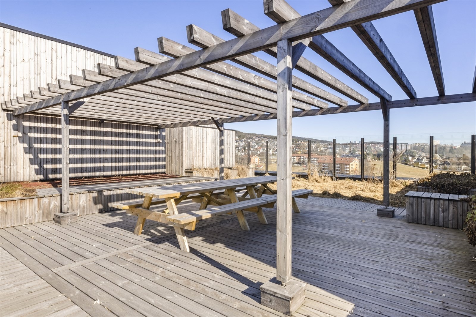 Sittegruppen på takterrassen danner en hyggelig og sosial møteplass. Galleribilde