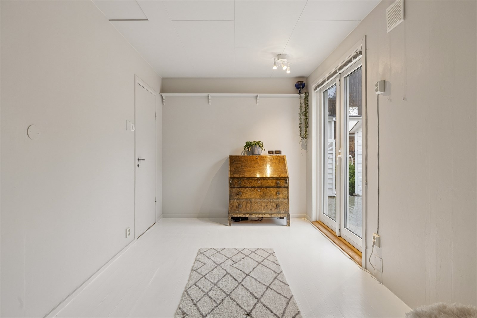 Begge soverommene har utgang til terrassen på baksiden. Galleribilde